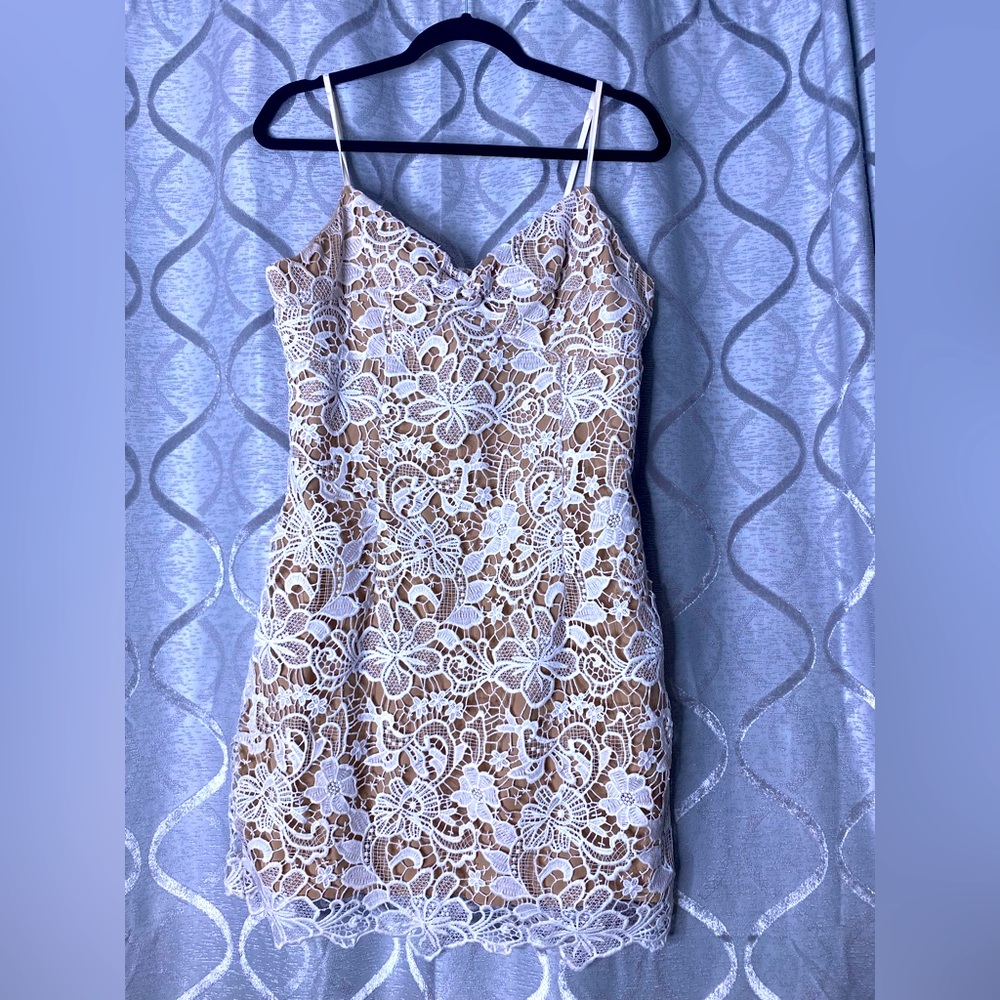 White lace body con dress.